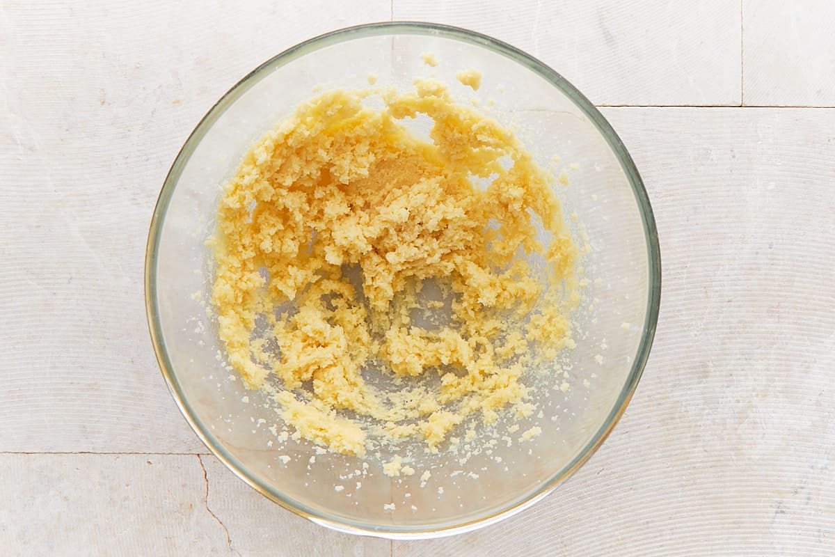 Creamed butter and sugars in a mixing bowl