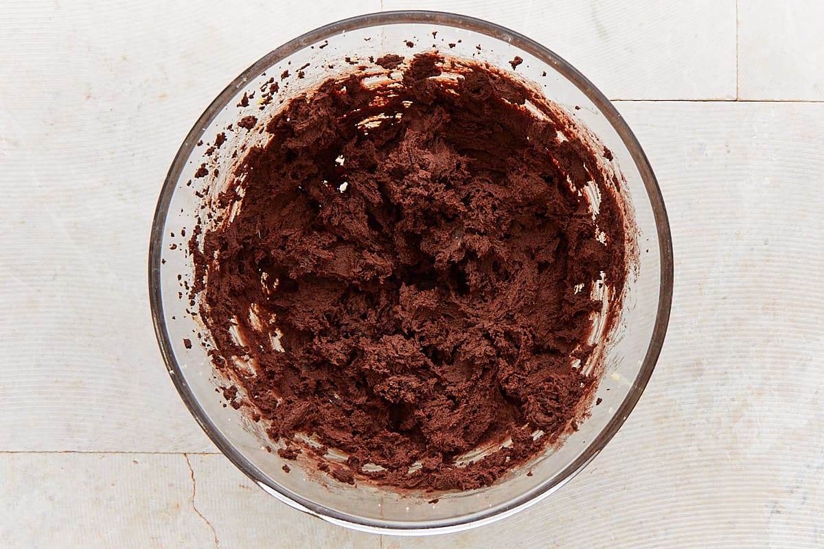 Mixed chocolate cookie dough in a mixing bowl