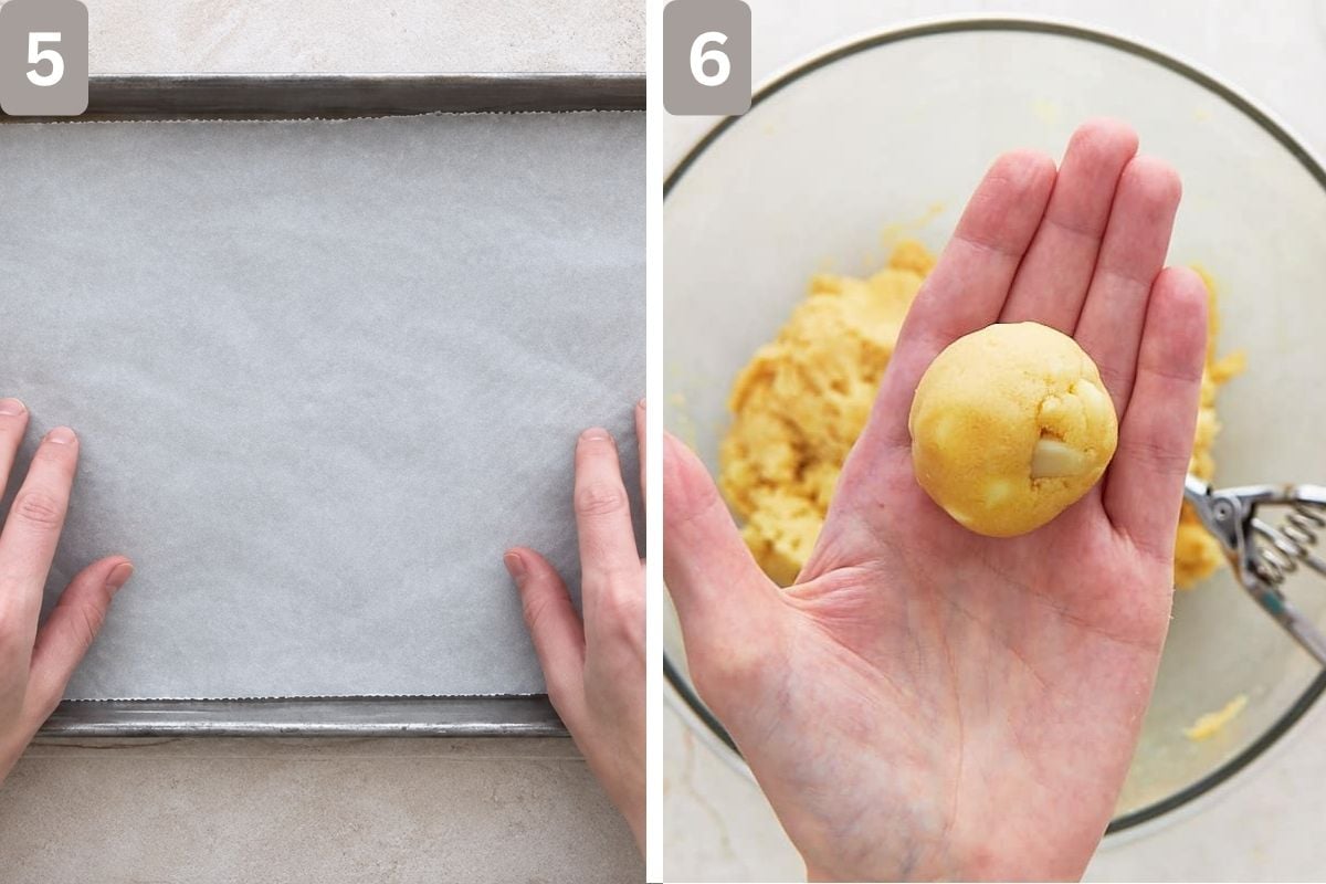 Baking tray lined with parchment paper and cookie dough rolled into balls