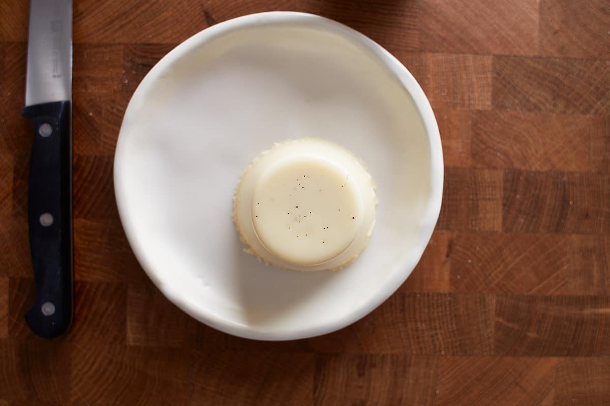 Unmolded panna cotta on a dessert plate
