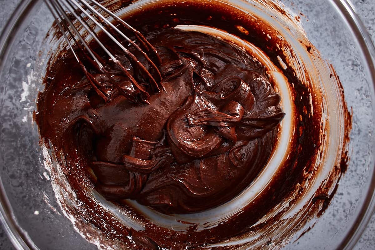 Whisked brownie batter in a bowl