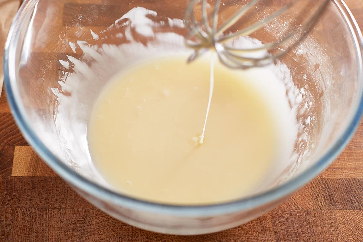 Whisking all glaze ingredients in a bowl