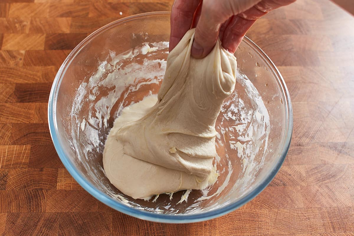 Stretching up the dough using fingers
