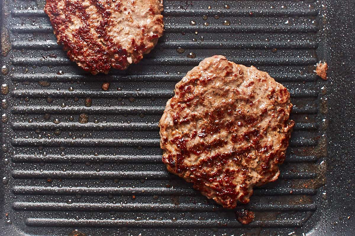 Cooked patties in a grill pan