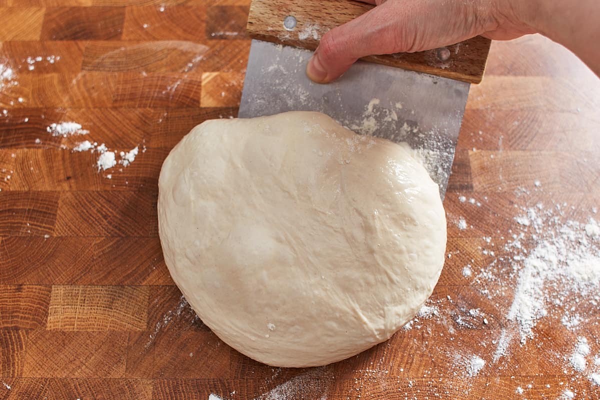 Preshaping bread dough with a bench knife