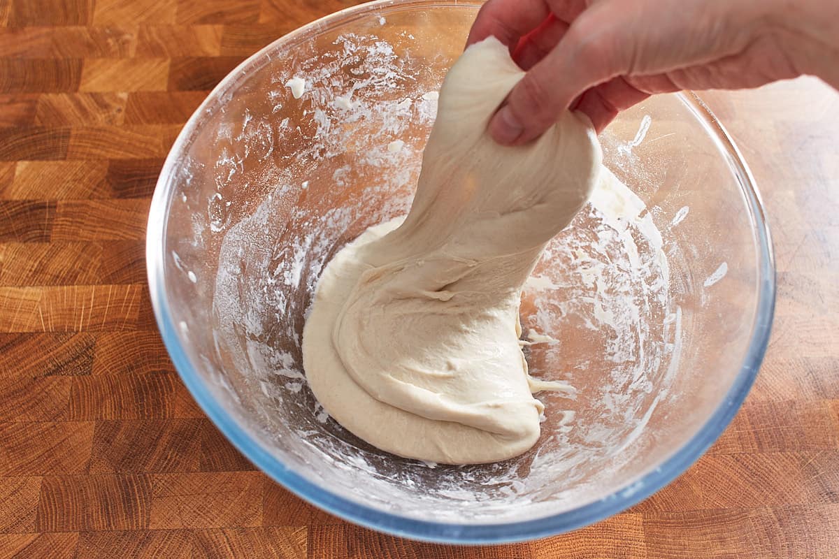 Stretching up a piece of dough