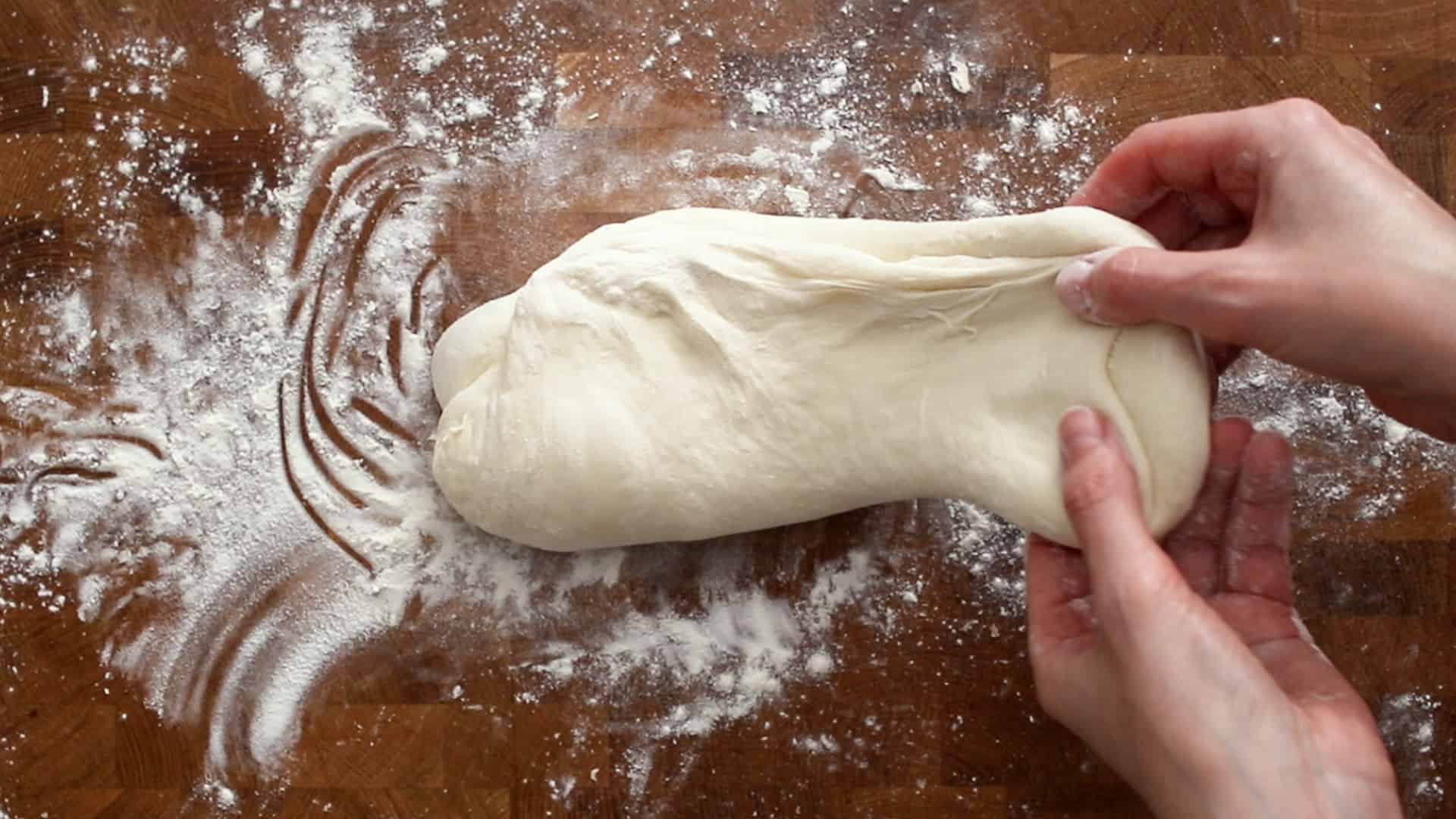 Stretching the right side of the dough