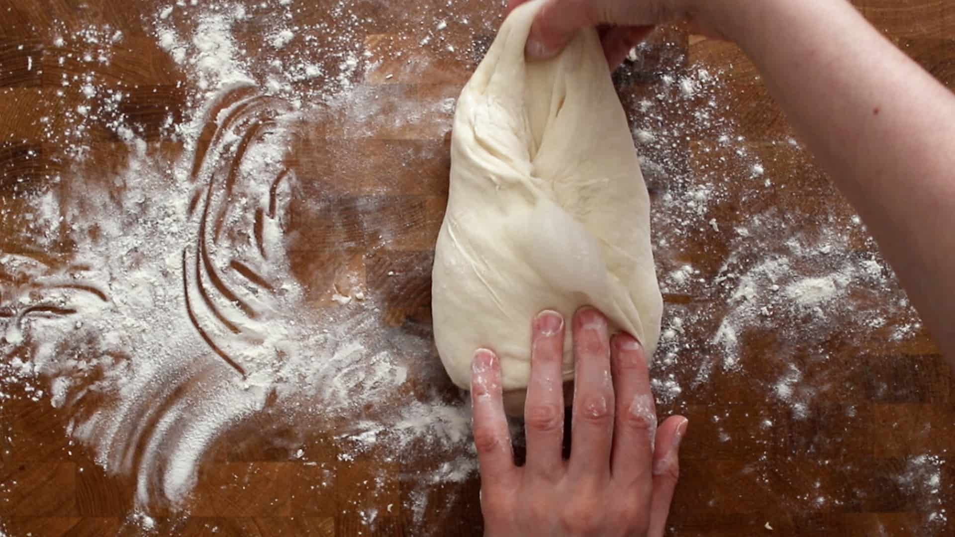 Stretching the last dough flap