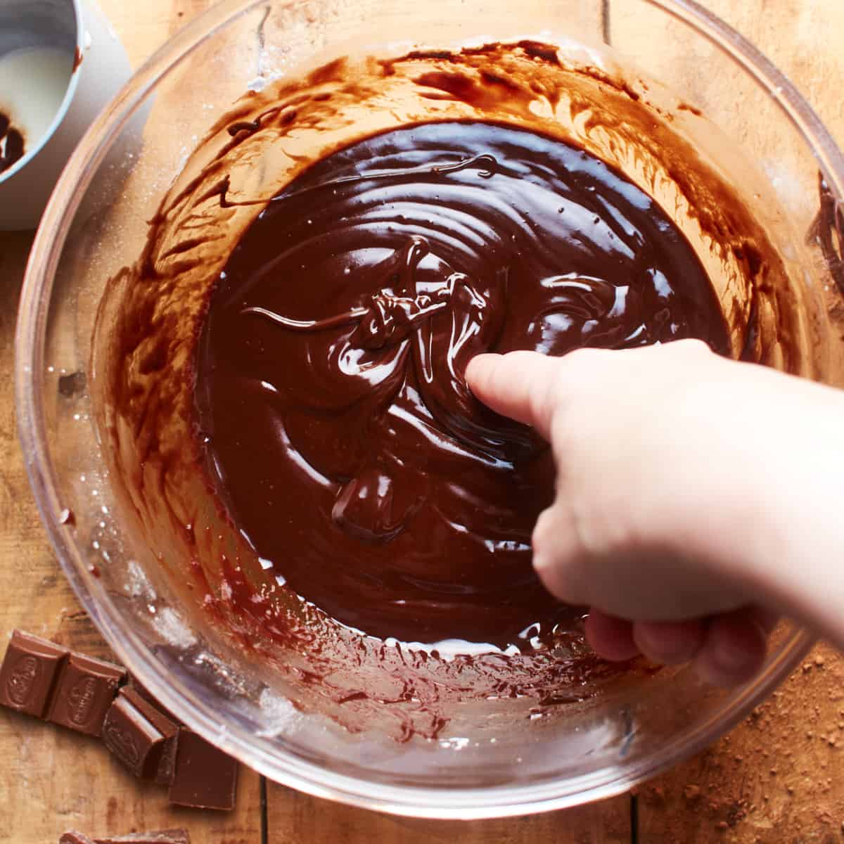 Sticking a finger in the chocolate batter
