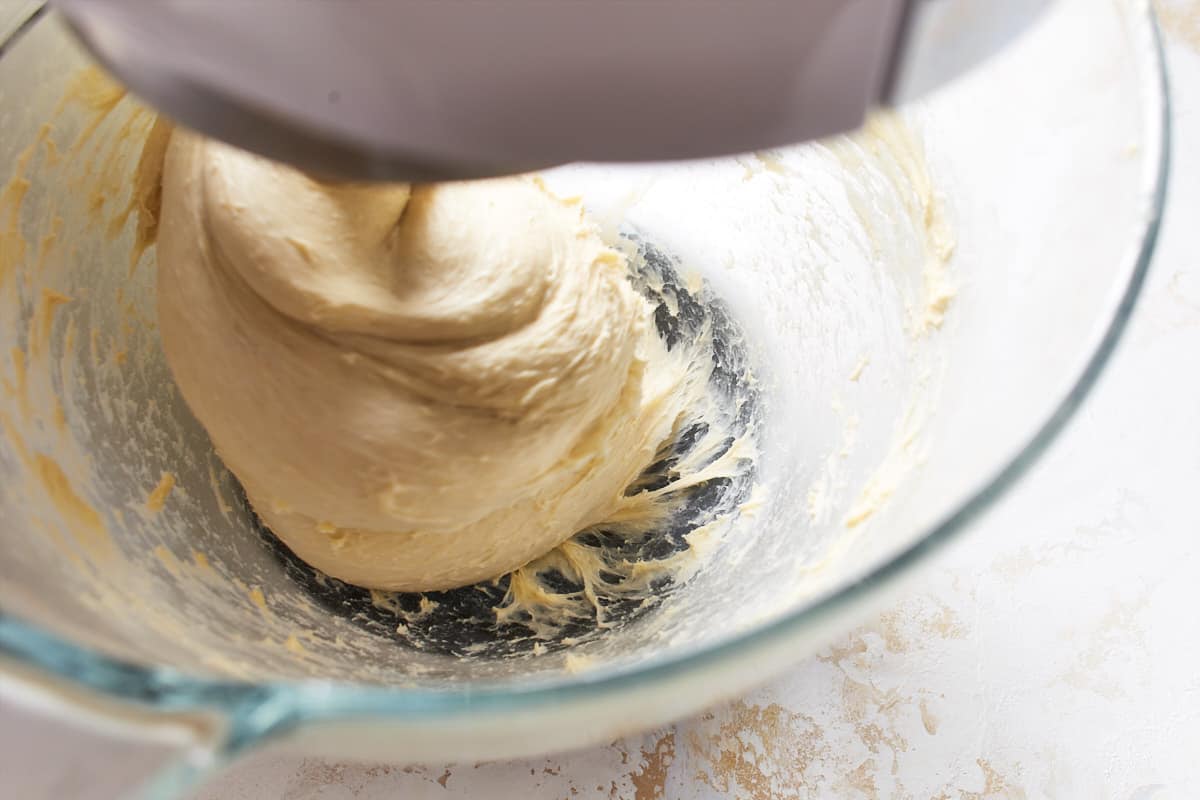 Kneaded bread dough in a mixing bowl