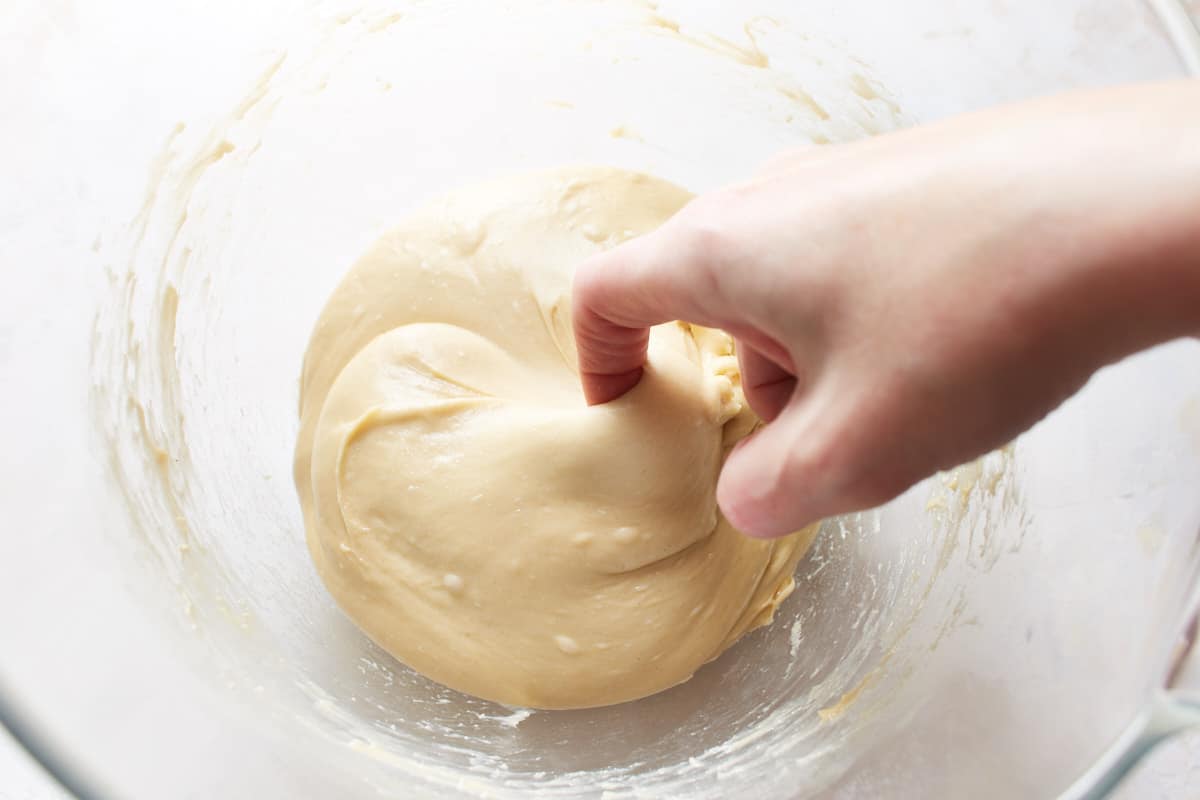 Hooking some dough with a finger