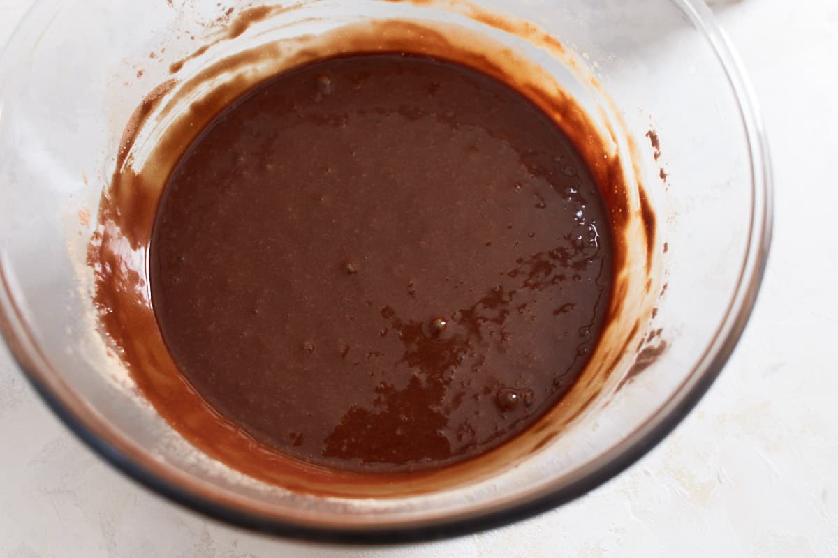 Whisked chocolate batter in a bowl