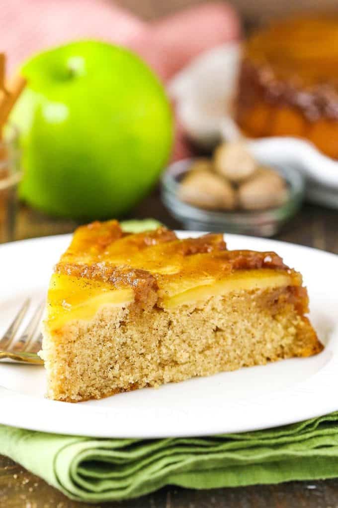 A slice of apple cake with apple slices on top