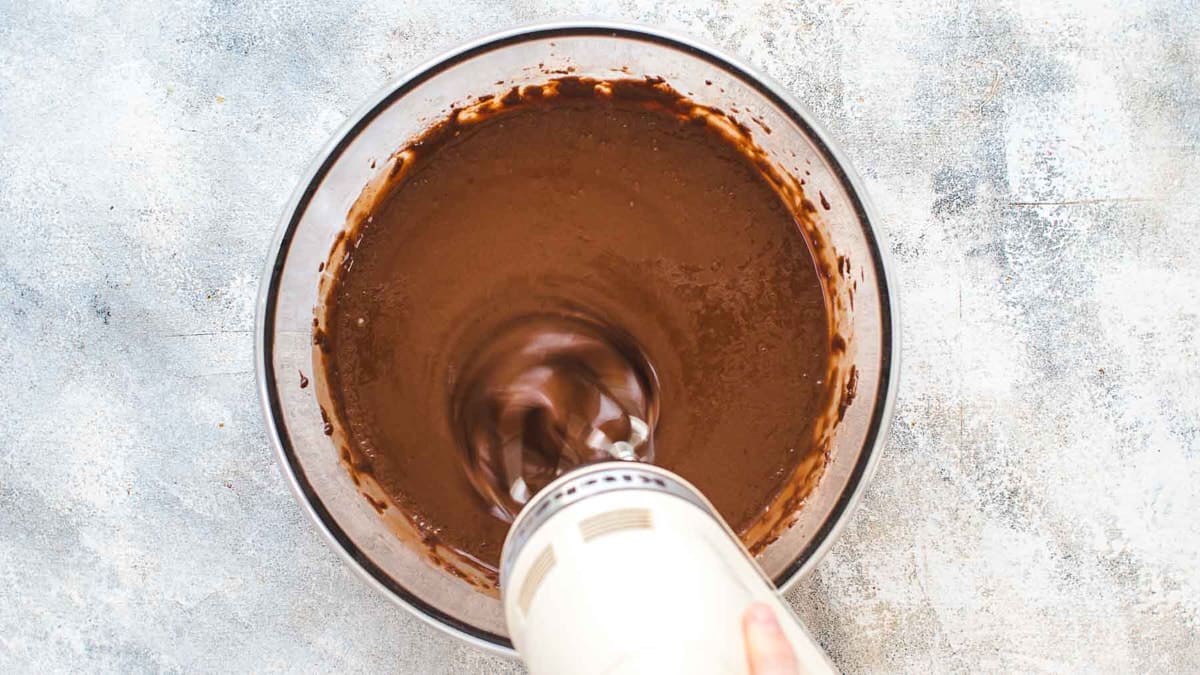 Mixing water into the chocolate batter