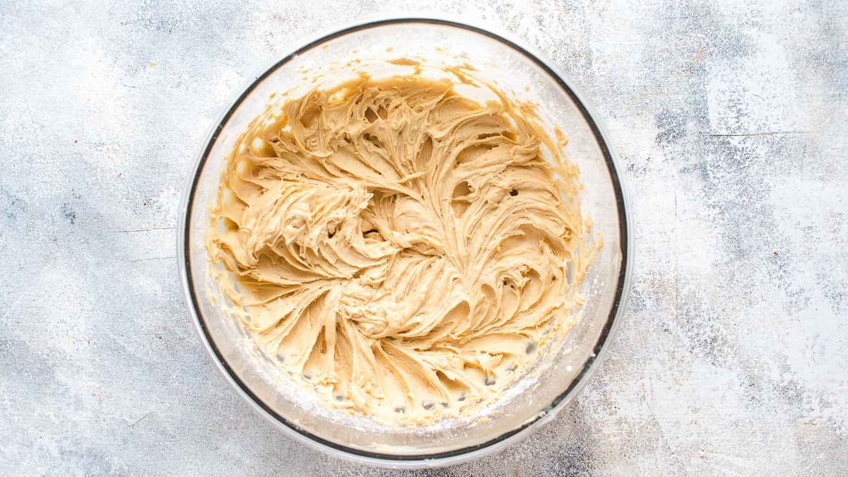 Mixed peanut butter frosting in a bowl