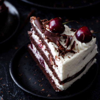 A slice of Black Forest cake on a dessert plate