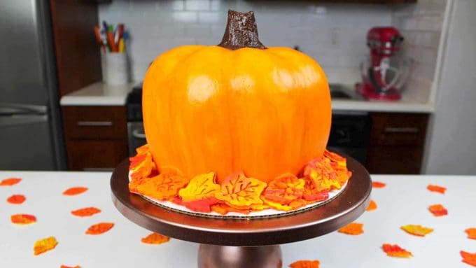 Cake shaped as a pumpkin on a cake plate