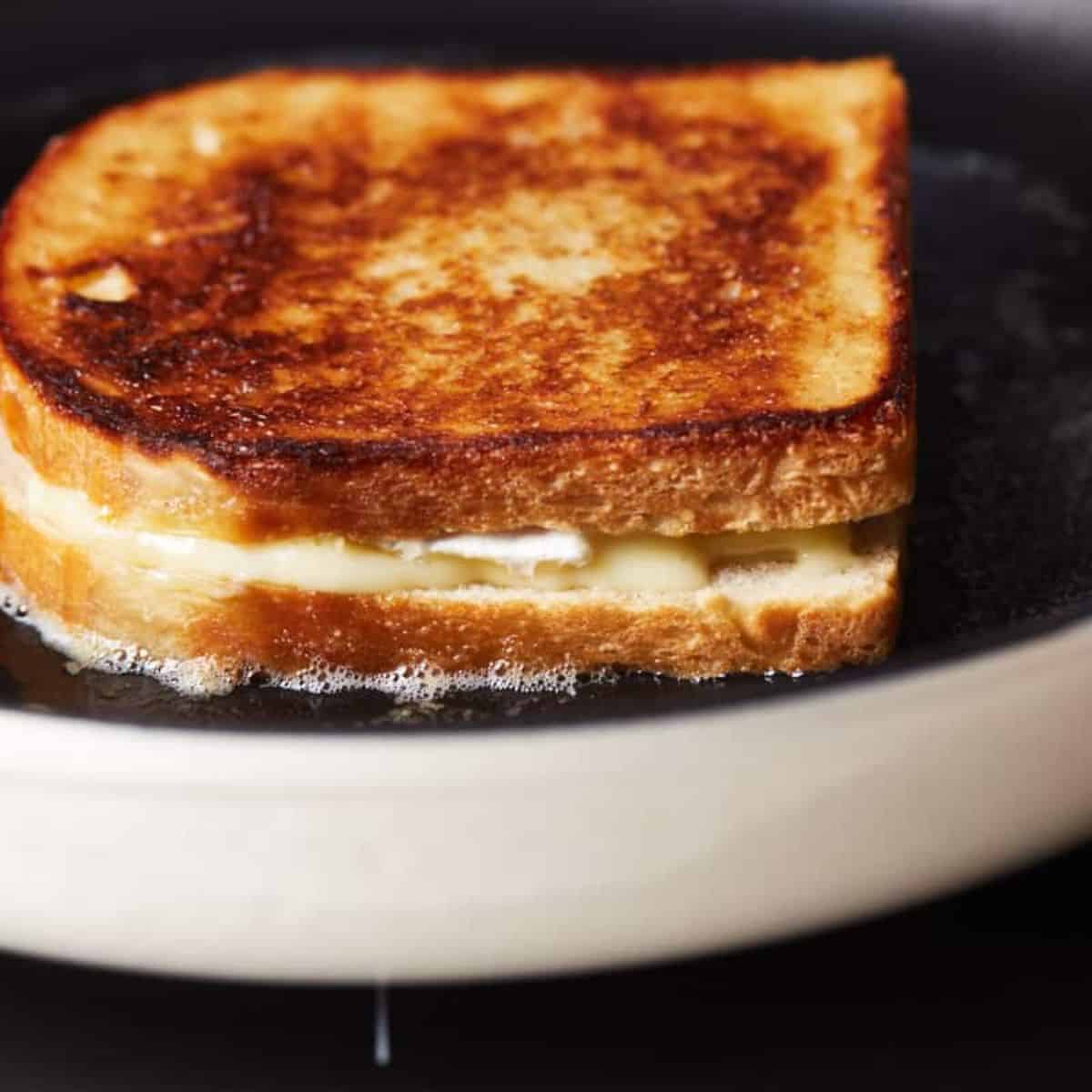 Image of the sandwich being fried in the pan