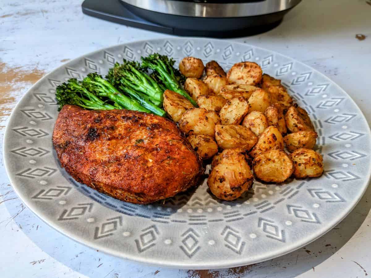 air fried chicken breasts with roast potatoes and broccoli
