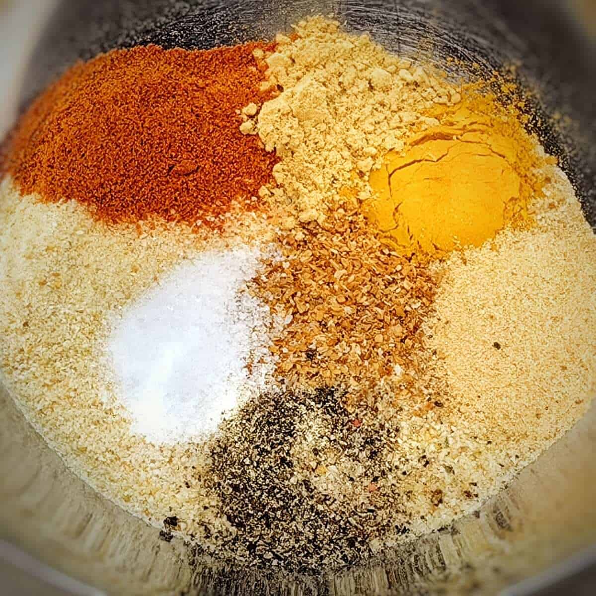 combine the breadcrumbs, seasonings and spices