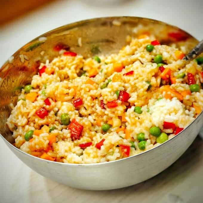 mix vegetables with rice and seasonings