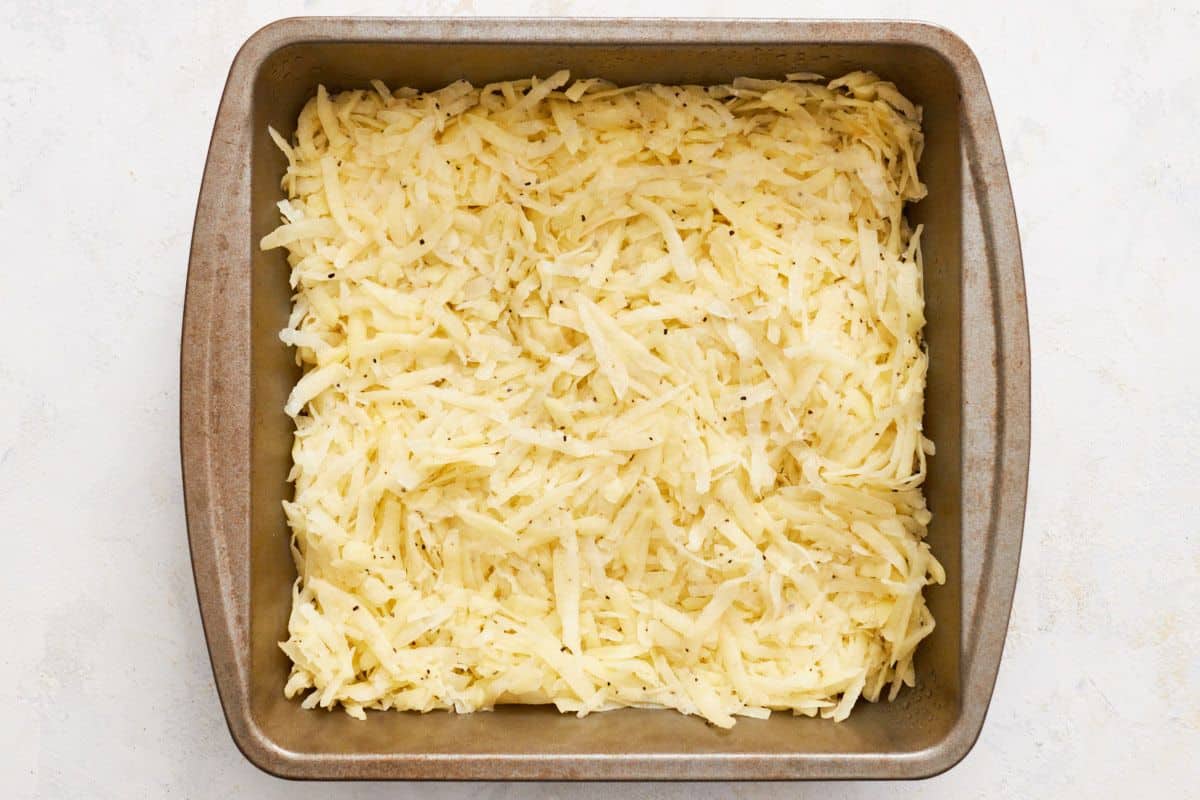 place the potato mixture in a paper-lined 8x8-inch baking pan