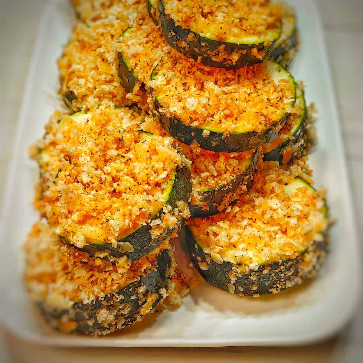 dip zucchini slices into the mixture