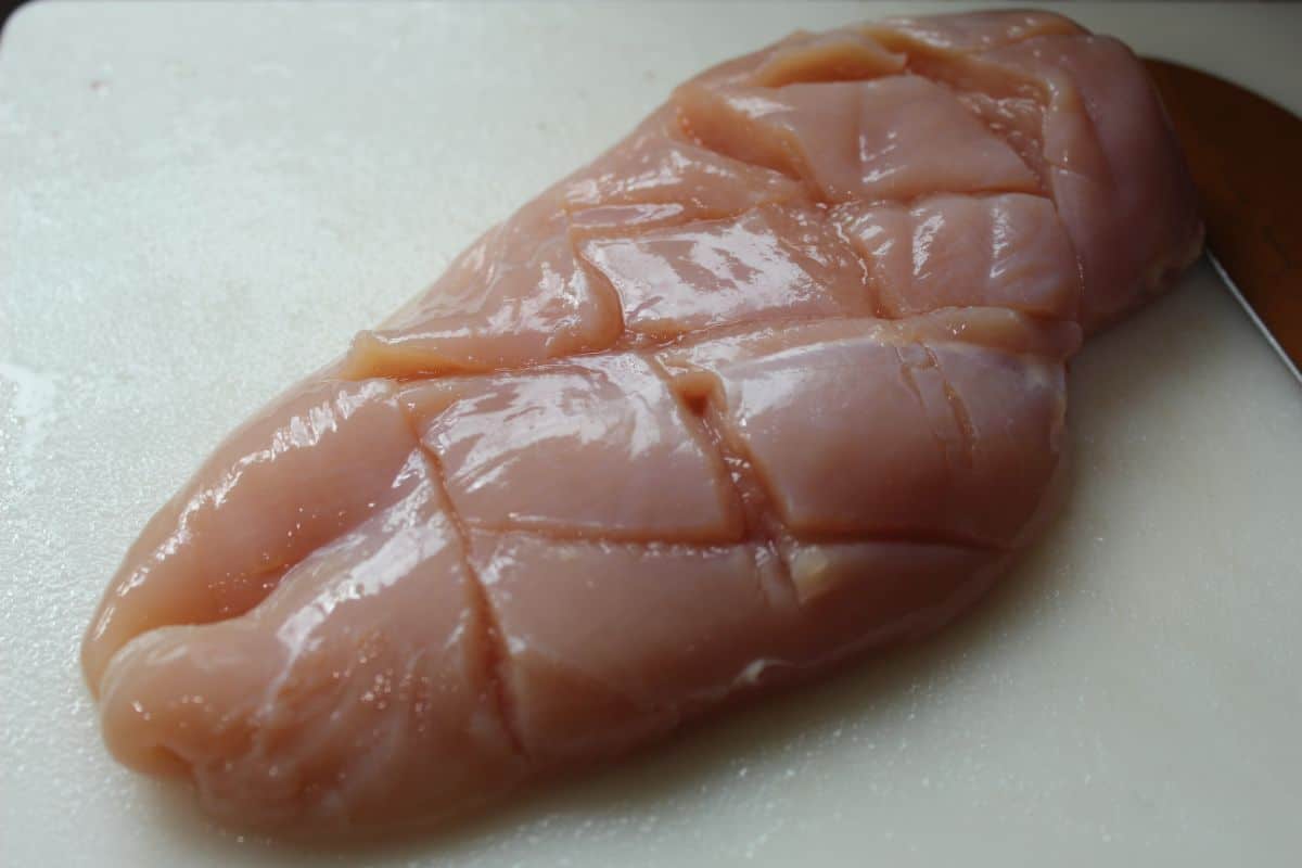 make few shallow cuts into your chicken breast