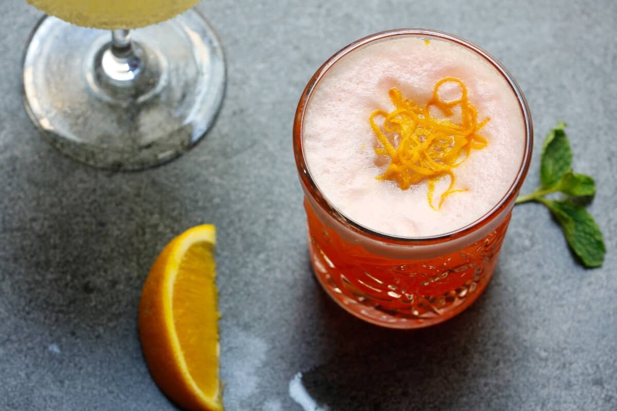 cocktail with orange and orange zest
