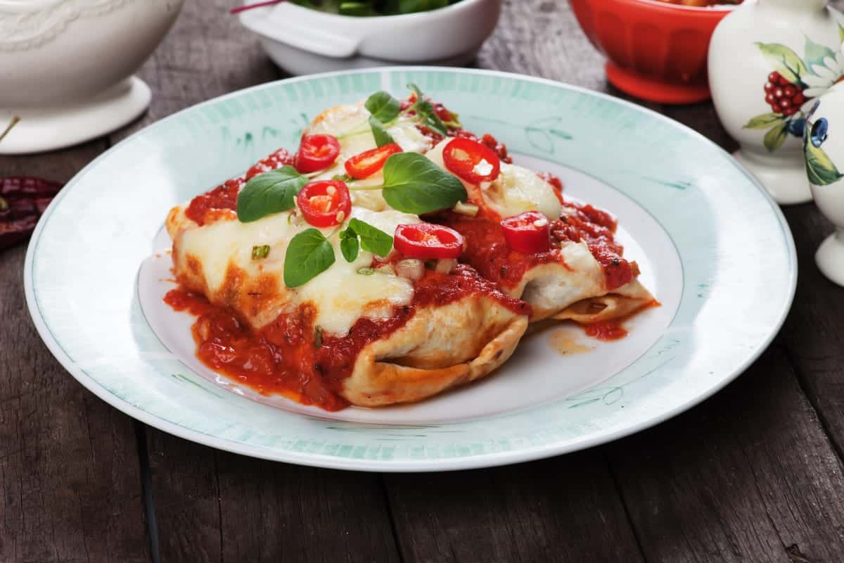 mexican enchilada with liquid hot sauce