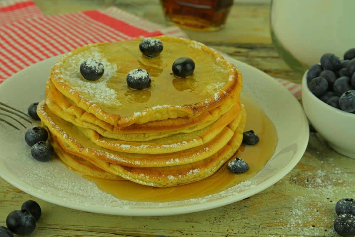 pancakes with fresh blueberries and syrup