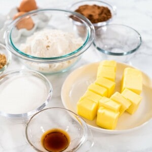 measured ingredients in glass mixing bowls to bake cookies
