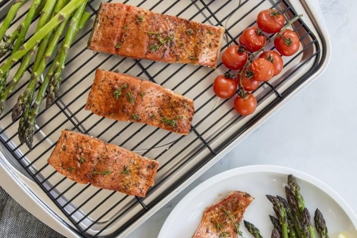 Nordic Ware Oven Crisp Baking Tray with meat and some sides