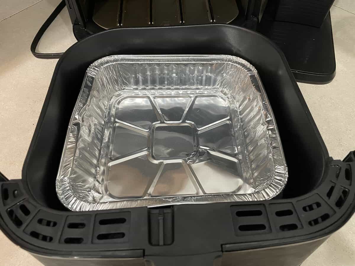 aluminum pan inside air fryer basket