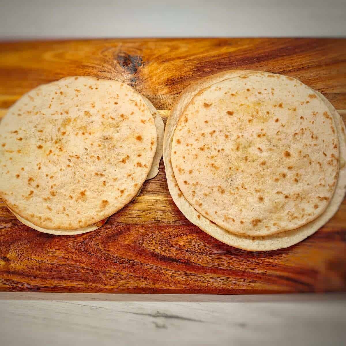 toasted tortilla on top of a serving board