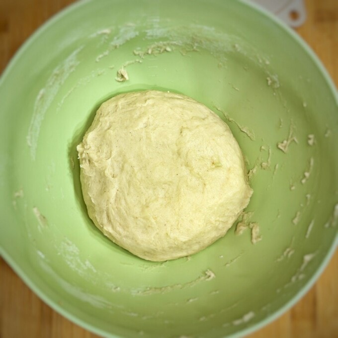 dough inside green mixing bowl