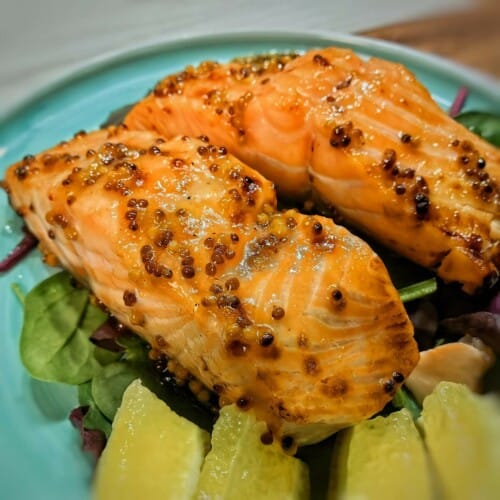 air fryer honey mustard salmon with lime wedges