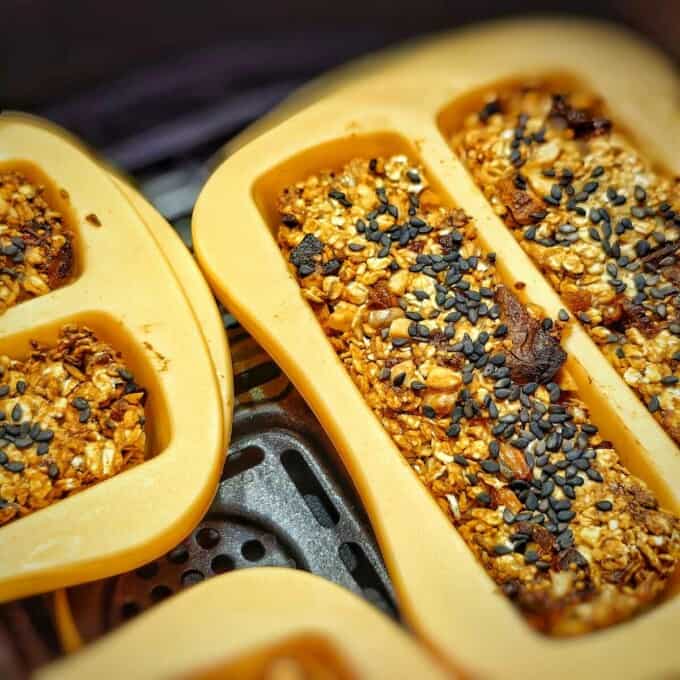 close up shot of air fryer oatmeal breakfast bars in air fryer basket