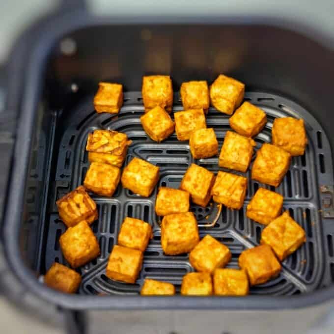 fried tofu in air fryer basket