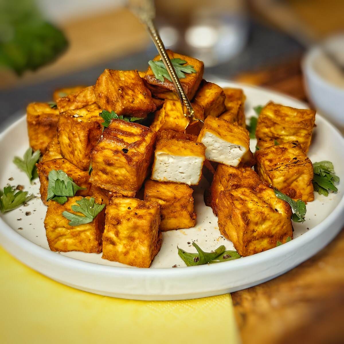 air fryer tofu on a white serving plate