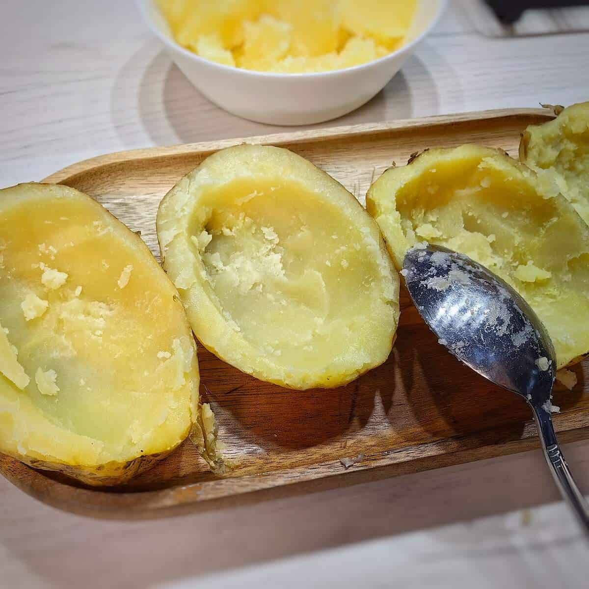 baked potatoes with insides scooped out