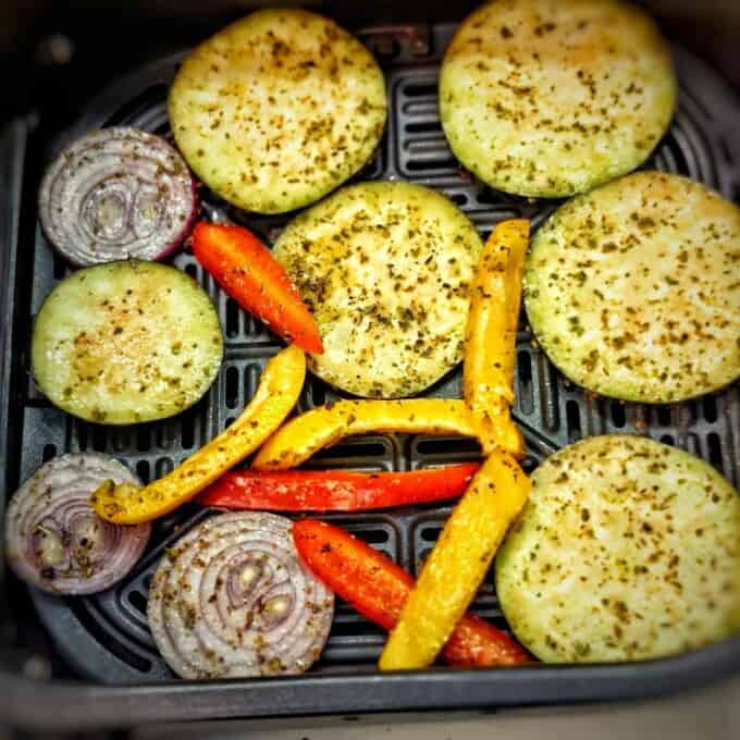 seasoned vegetables inside air fryer basket