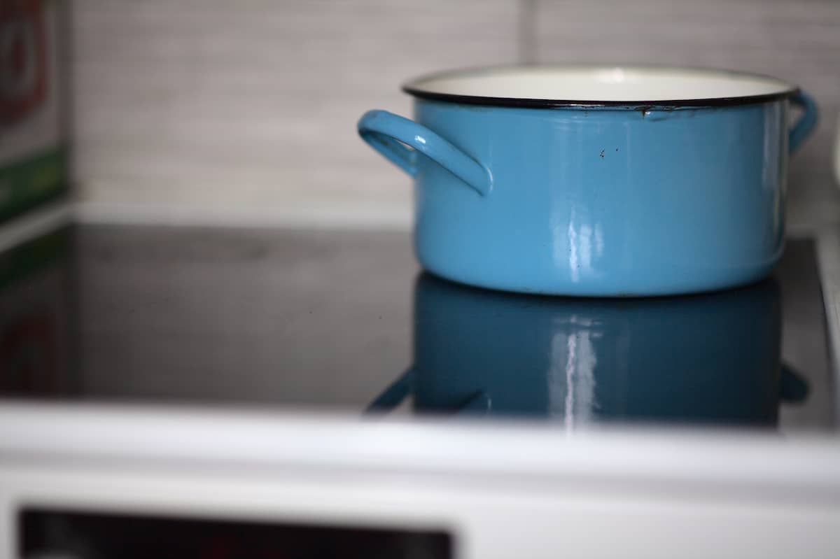 closeup shot of blue casserole in a kitchen