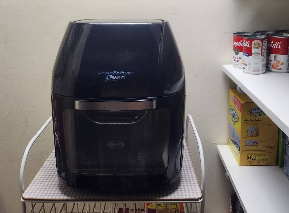 an air fryer in a pantry or cabinet