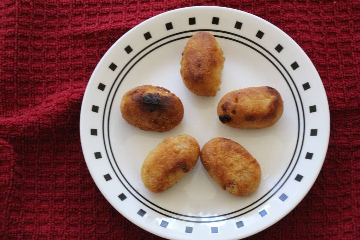 air fried mini corn dogs on a white serving plate