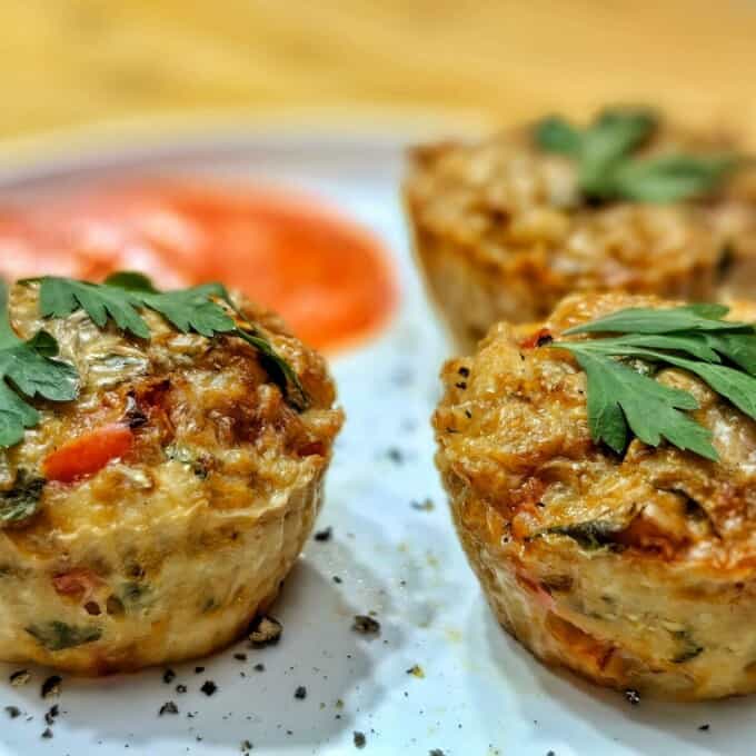 air fryer chicken muffins with parsley on a plate