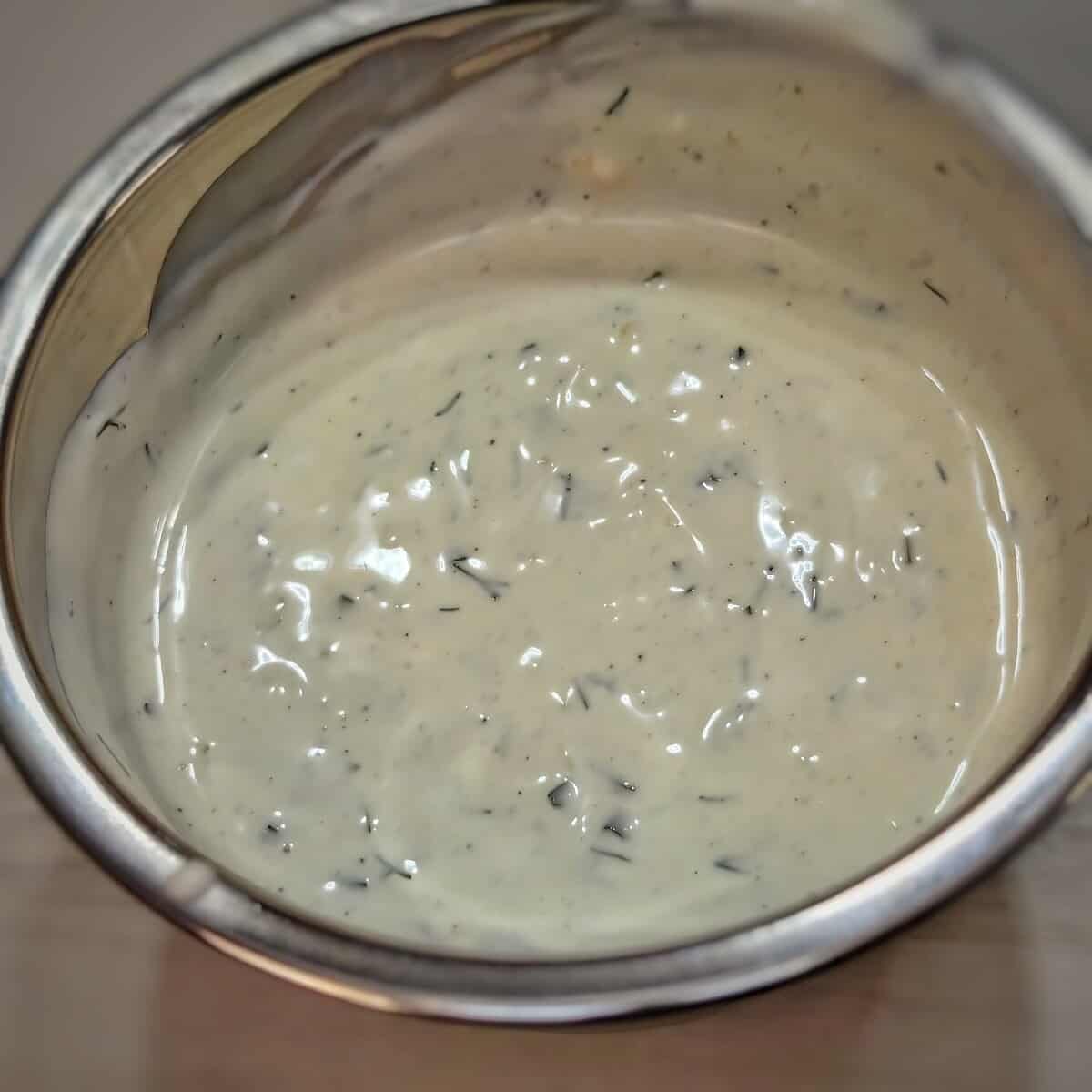 homemade ranch dressing in a mixing bowl