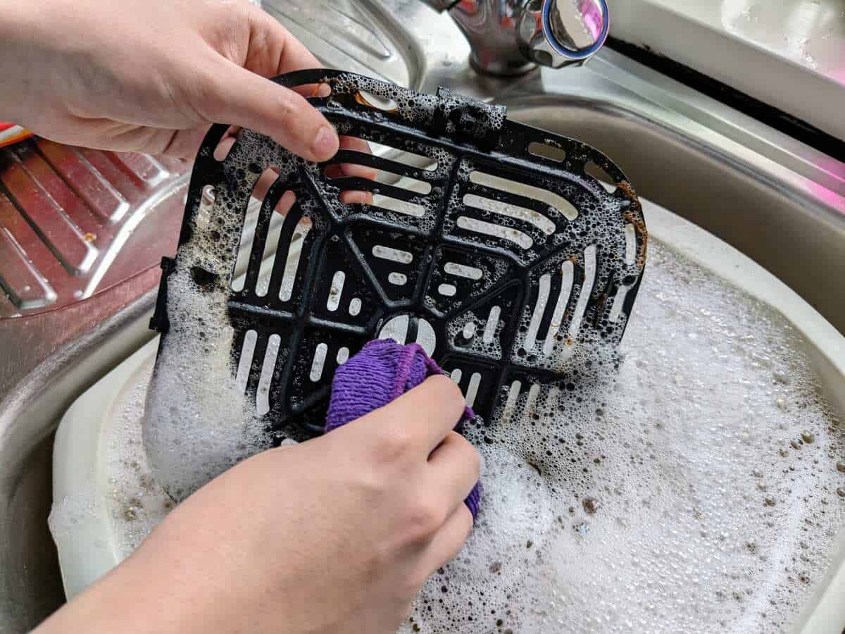 washing air fryer basket metal plate