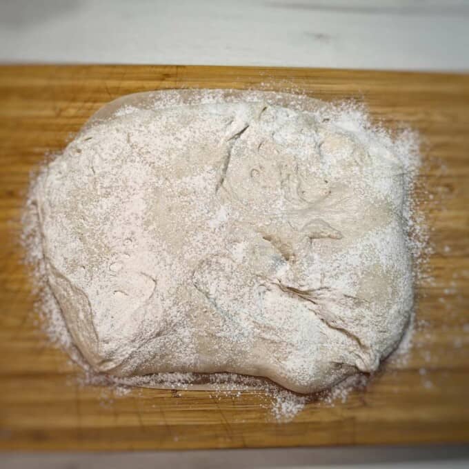 floured ciabatta dough on top of chopping board