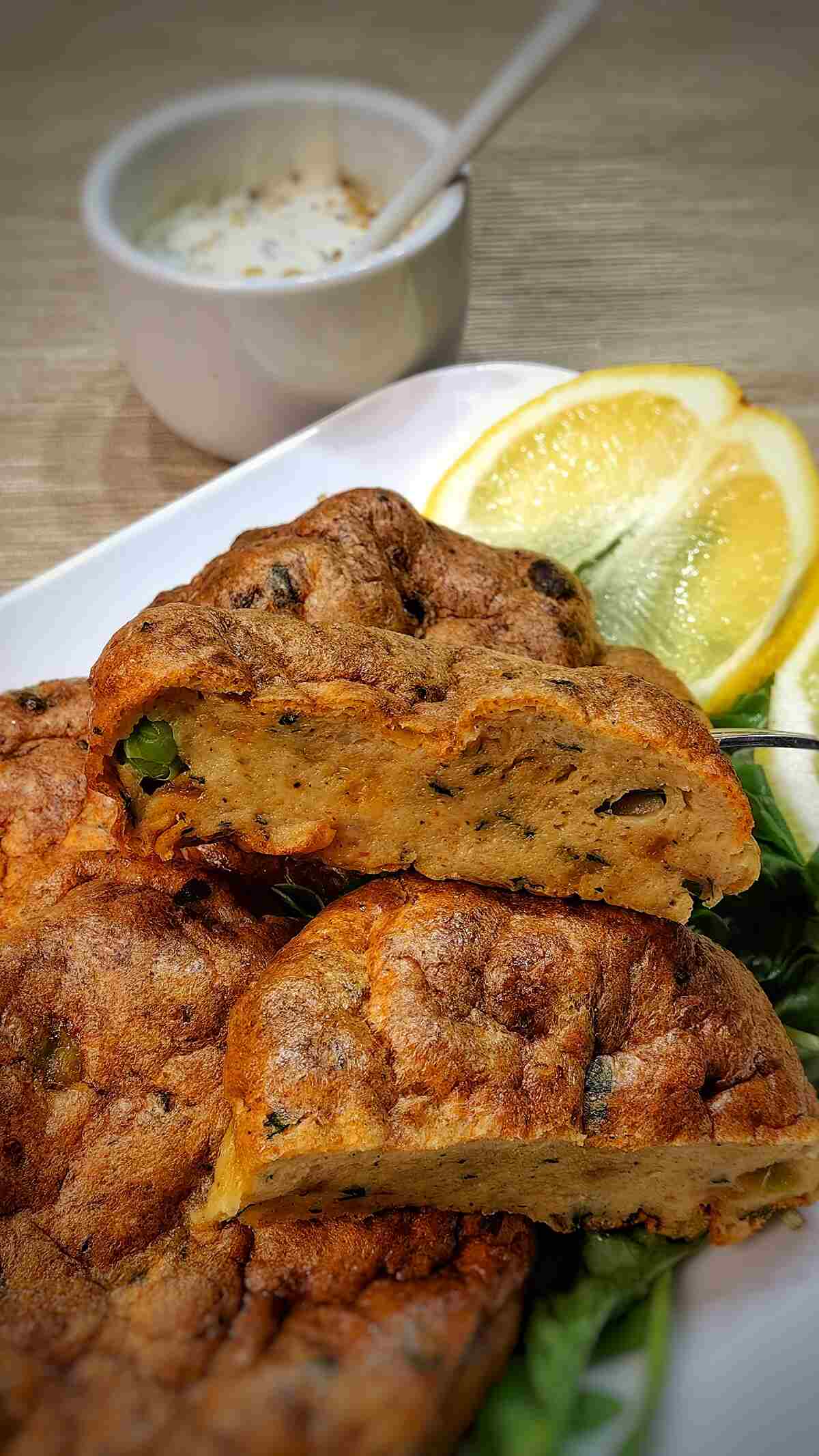 air fryer fish cakes with lemon and greens